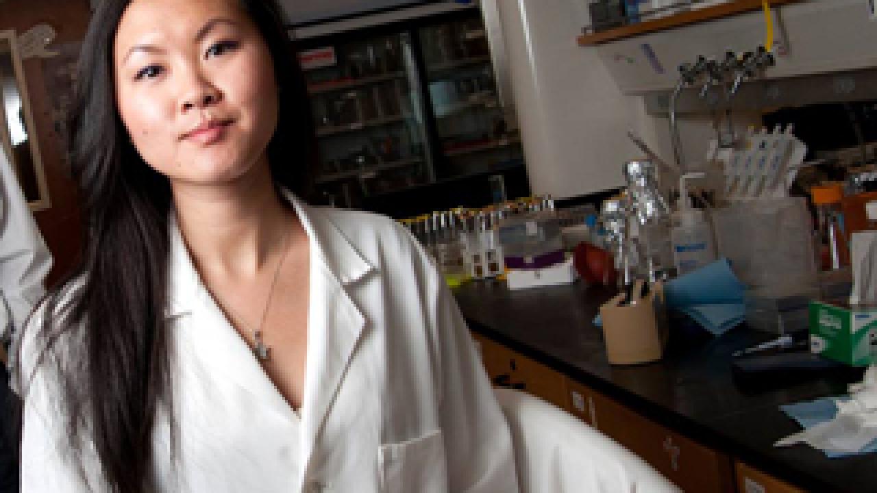 Woman in lab coat