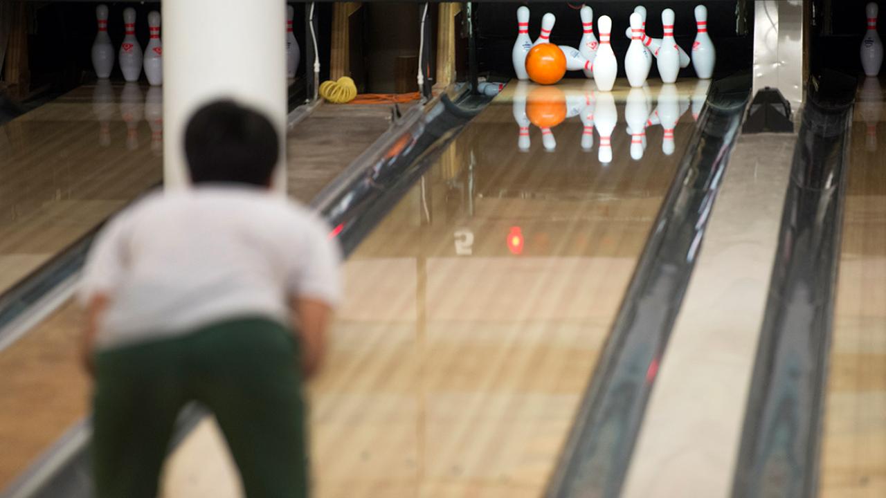 A player bowls at UC Davis.