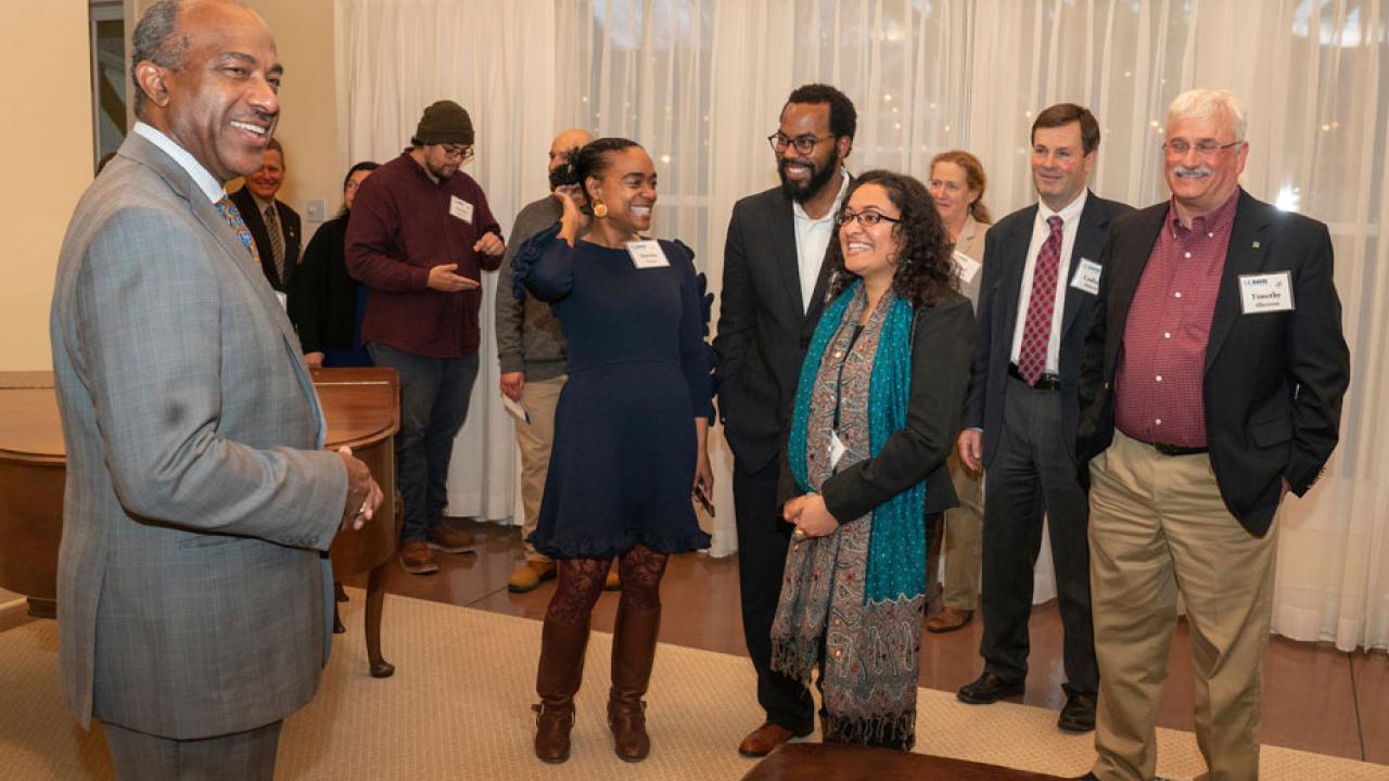 Chancellor Gary S. May mingles with reception guests at Chancellor's Residence.
