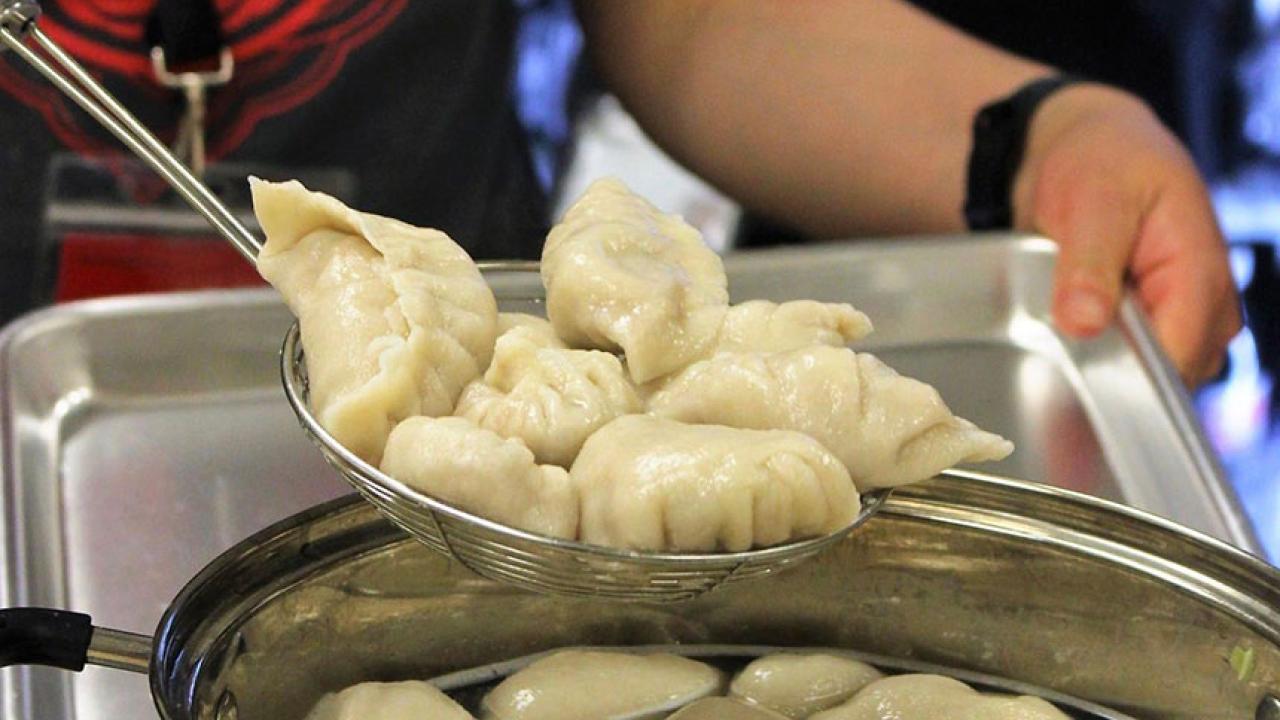 Chinese food in a ladle