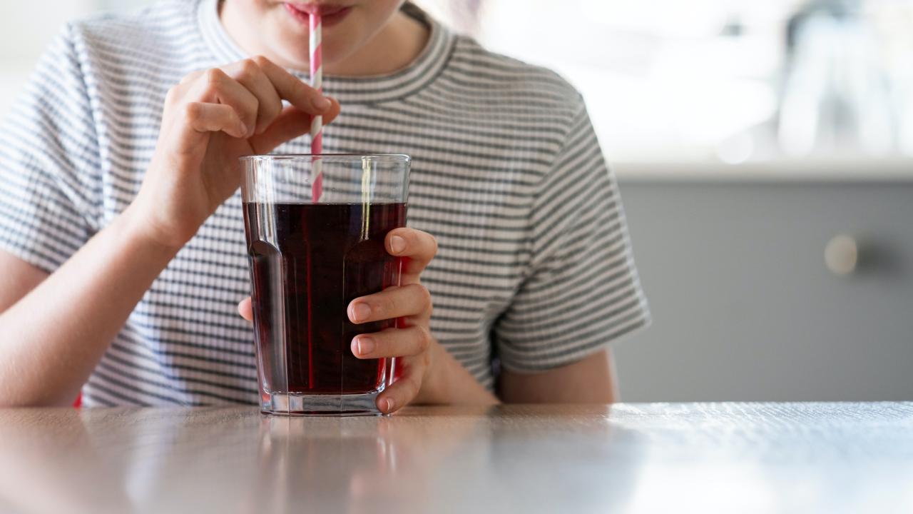 woman drinking soda