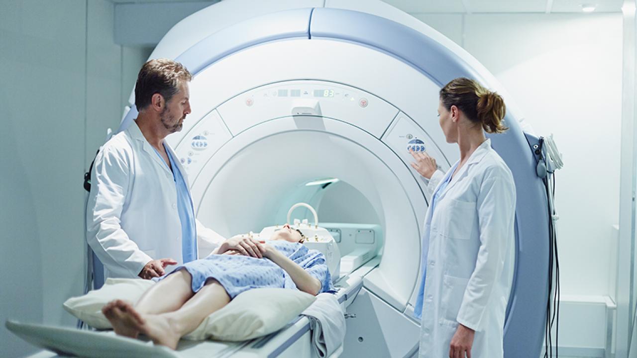 Stock photo of patient being prepared for MRI scanning. 