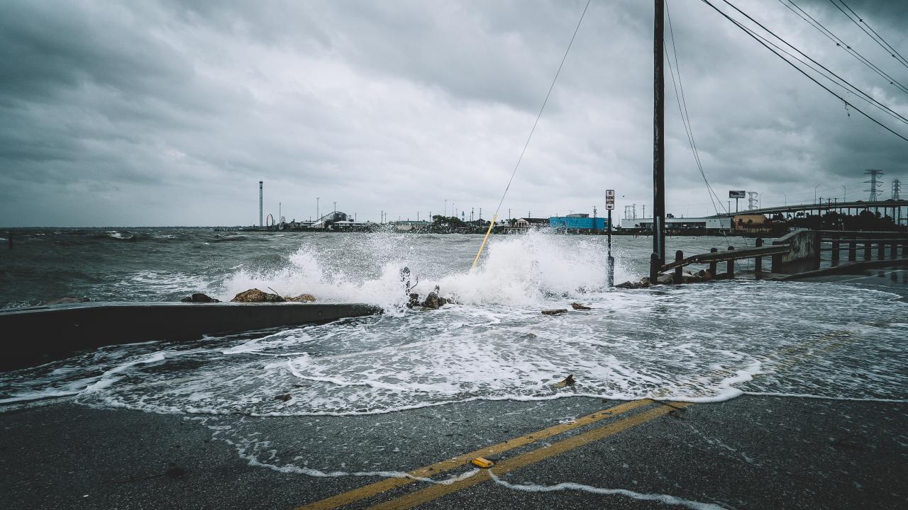 Sea level rise, water over bridge