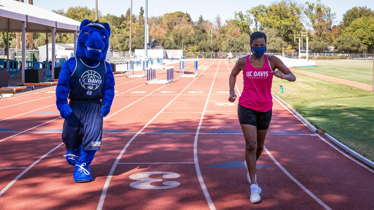 Gunrock and LeShelle May run on a track.