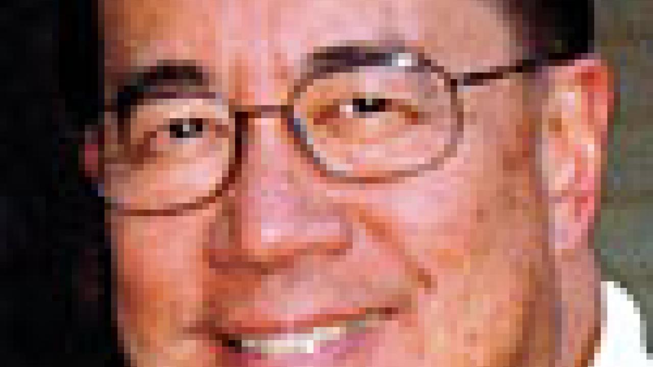 Photo: face shot of Gus Lee
