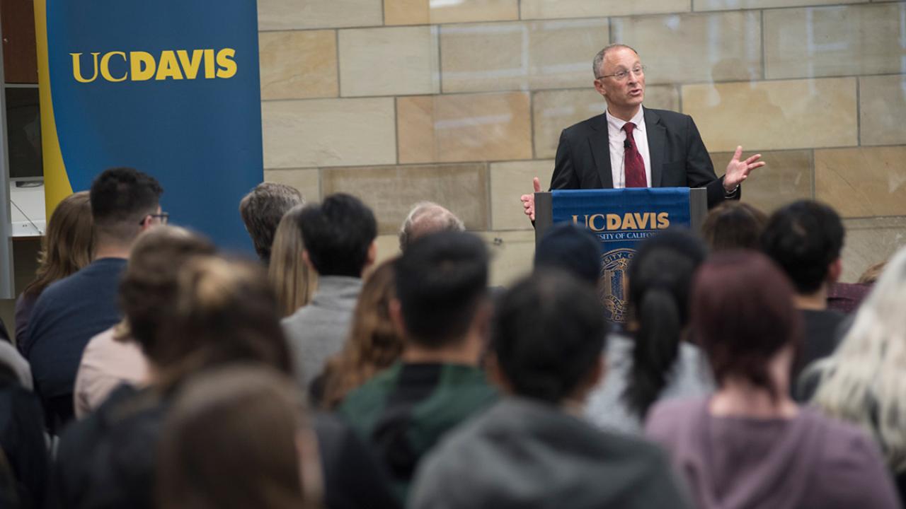 Interim Chancellor Ralph J. Hexter speaks to a crowd.