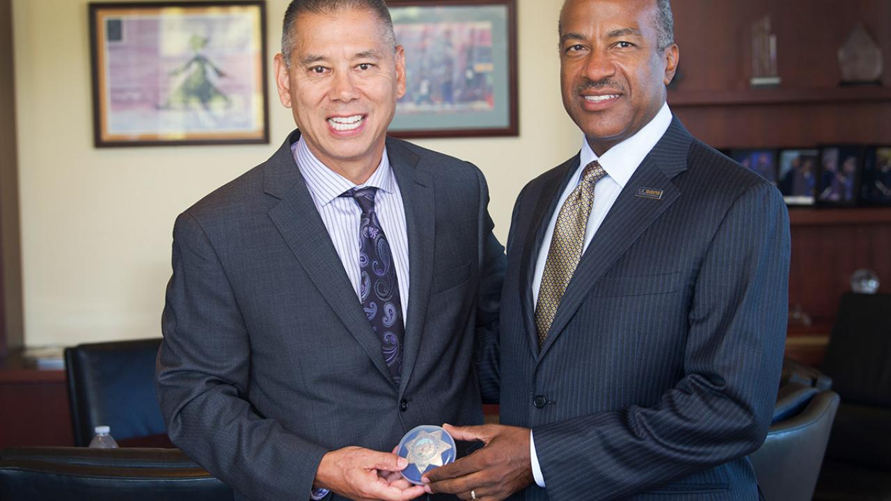 Police Chief Joseph A. Farrow with Chancellor Gary S. May