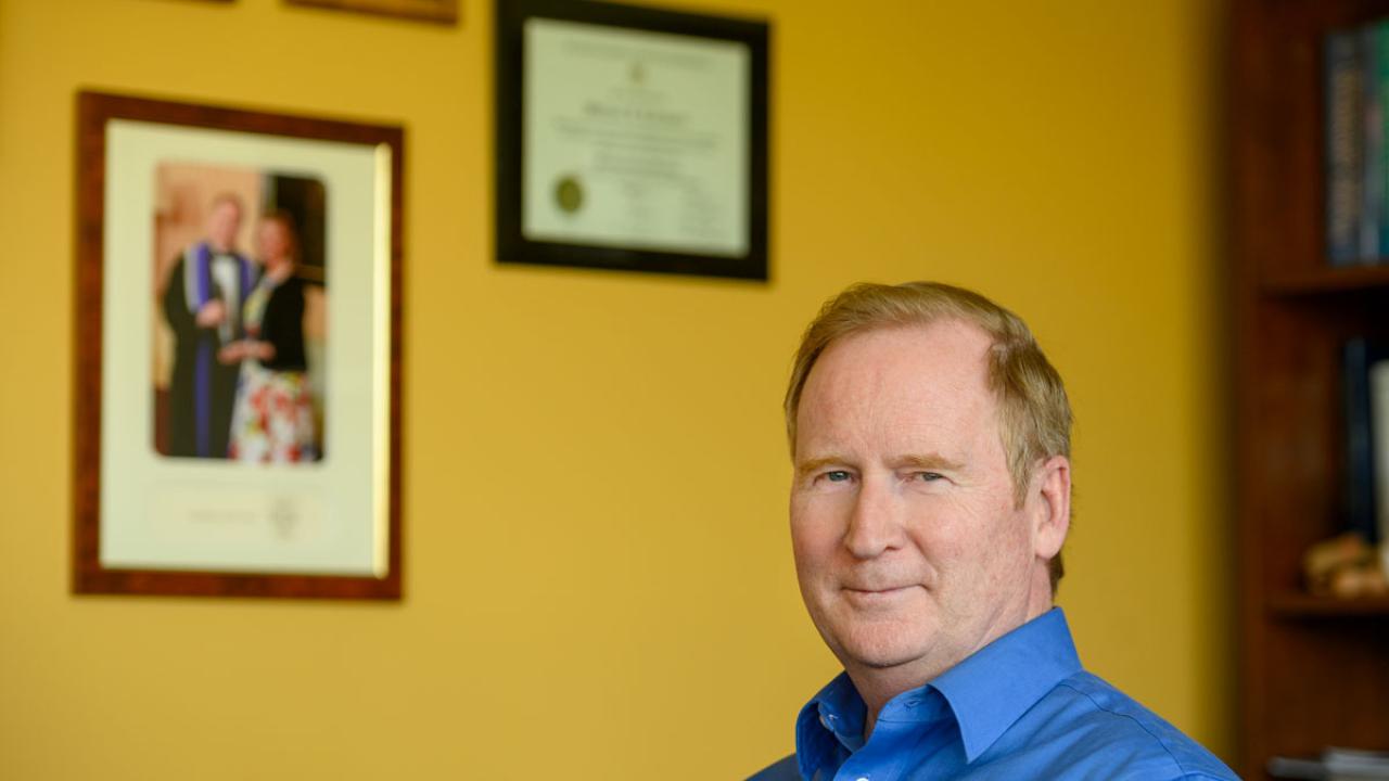 Dean Michael Lairmore, portrait, in his office.