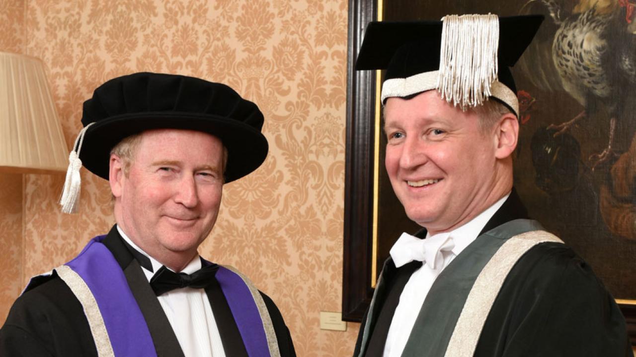 Two men in academic regalia