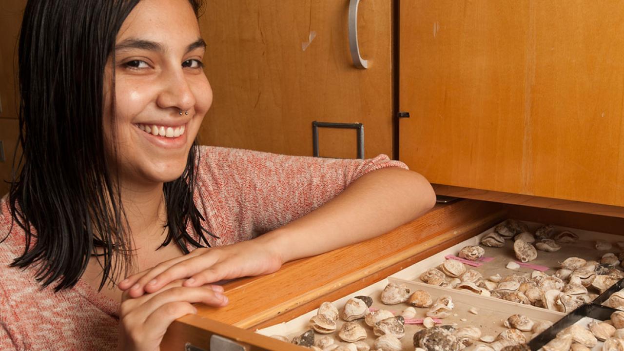 Photo: Natalia Lopez Carranza displays the fossils she is studying