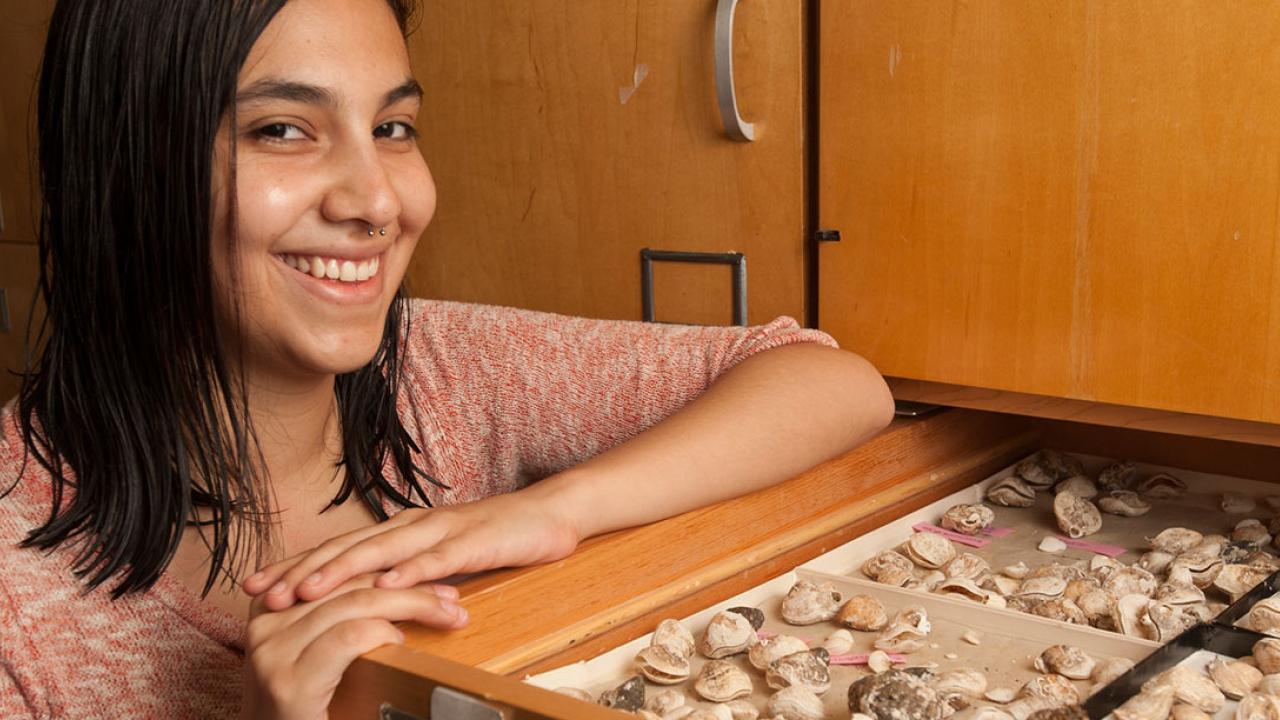 Photo: Natalia Lopez Carranza displays the fossils she is studying