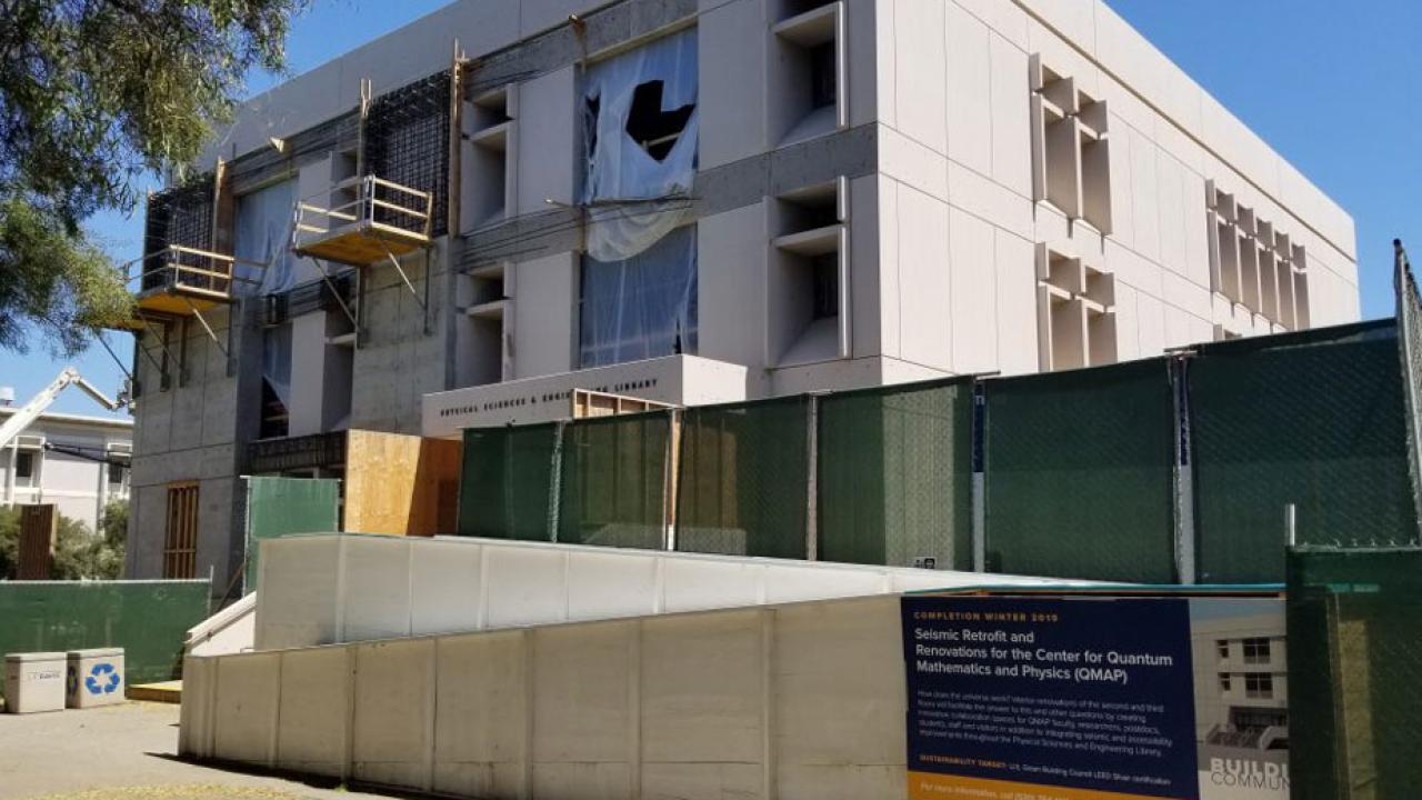 Physical Sciences and Engineering Library exterior, behind construction fence