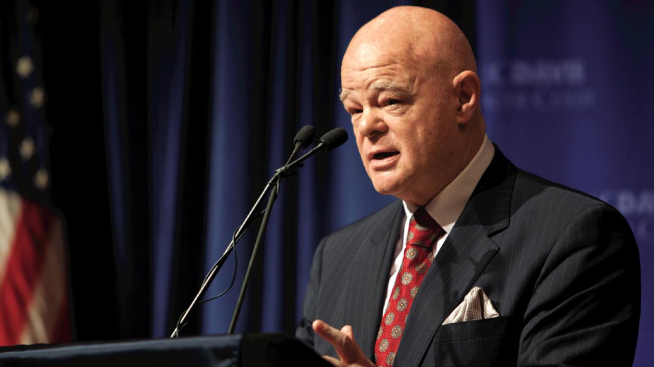 Ralph W. de Vere White at podium.