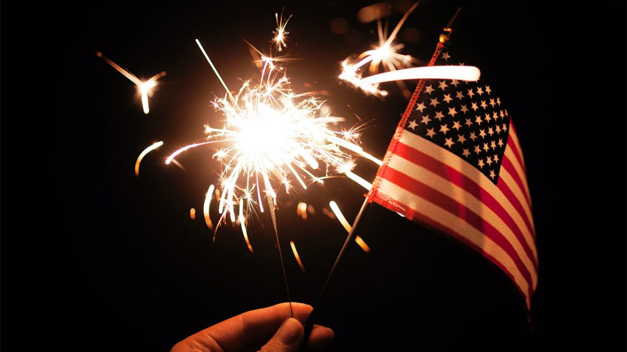 Sparkler and American flag.