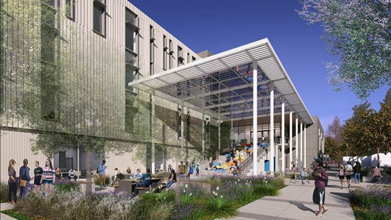 Artist's rendering shows two-story-high canopy over stadium seating and a stairway.