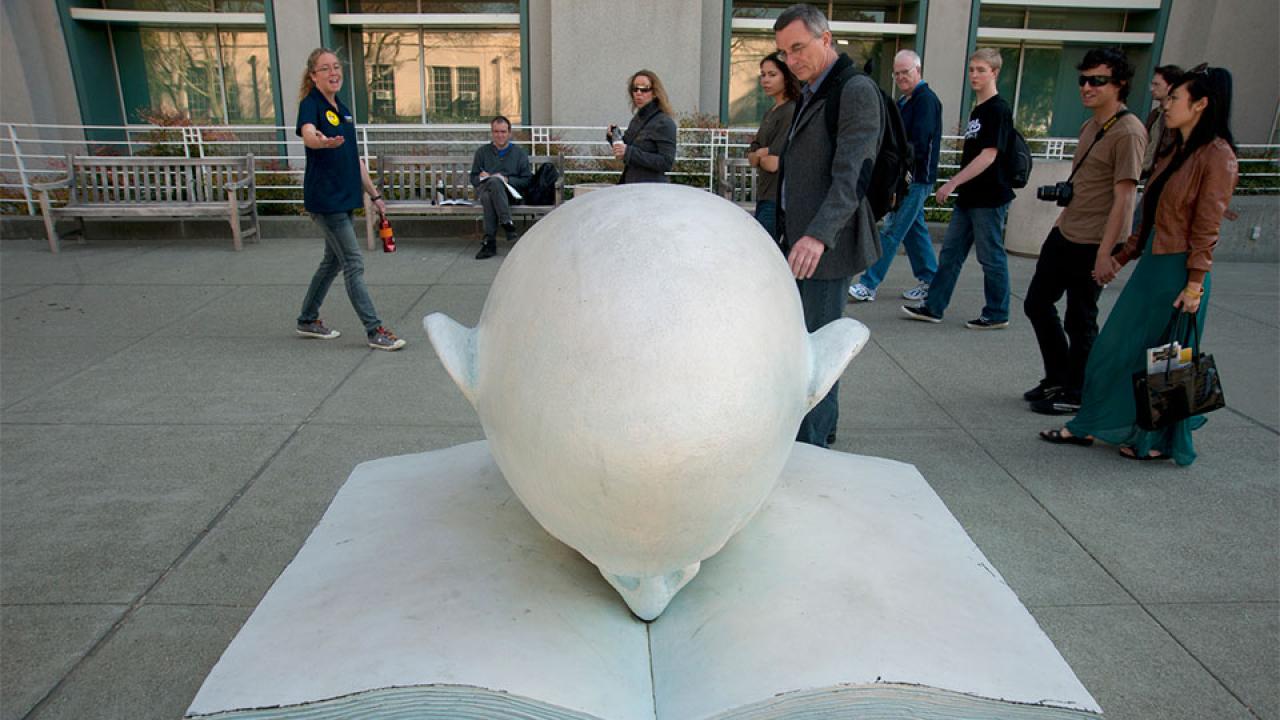 A tour group goes past an Egghead