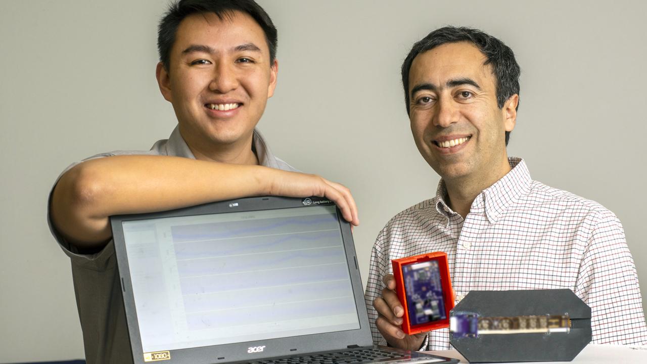 Daniel Fong and Soheil Ghiasi with fetal monitor.