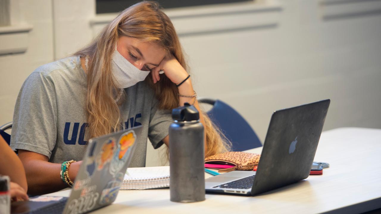 student working on homework