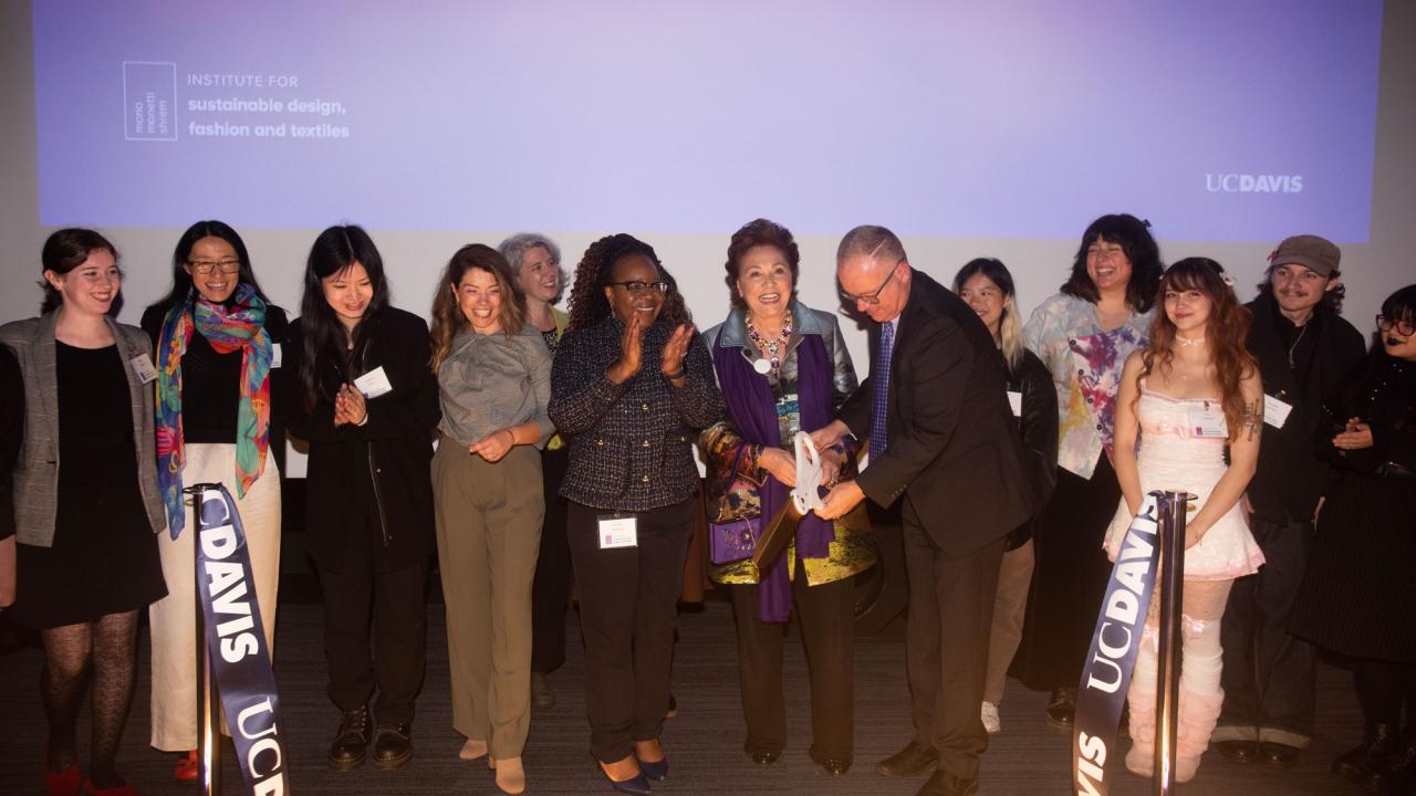 group of people in ribbon cutting photo