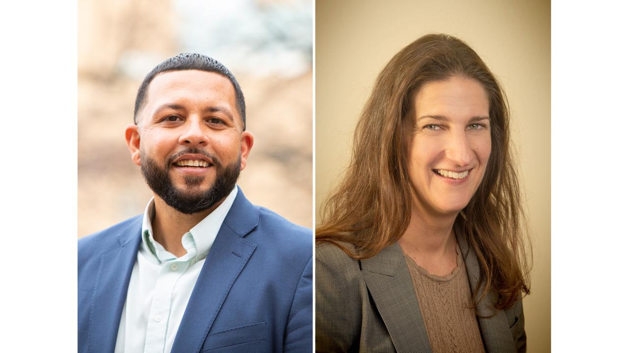 On left, head and shoulders of a smiling man with short dark hair and a short beard wearing a blue sports coat with open collar shirt; on right, head and shoulders of a smiling woman with long brown hair wearing a brown sweater. 