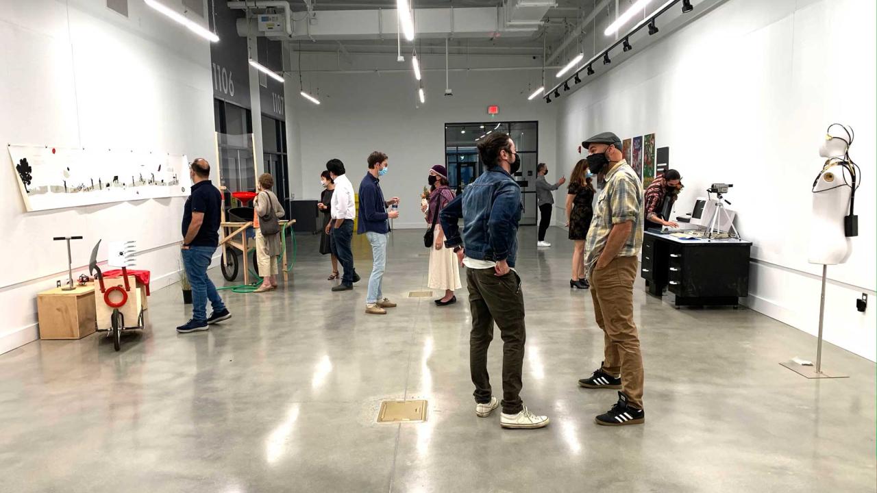 Cruess Hall's new lab with students milling about and looking at projects.