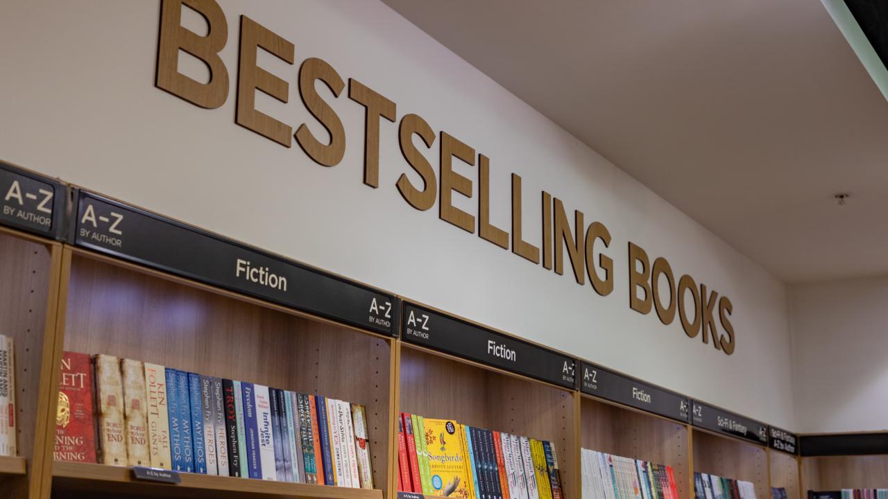 books on shelves with title "best-selling books"