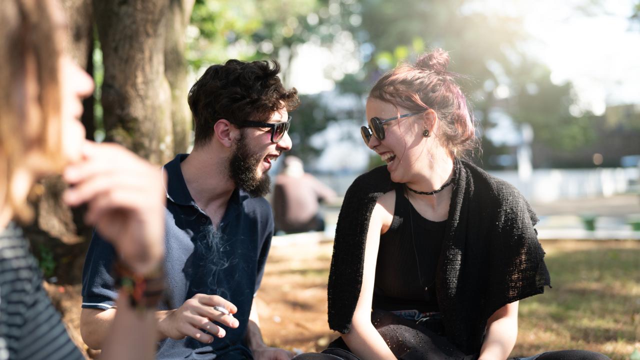 Group of youth  smoking outdoors