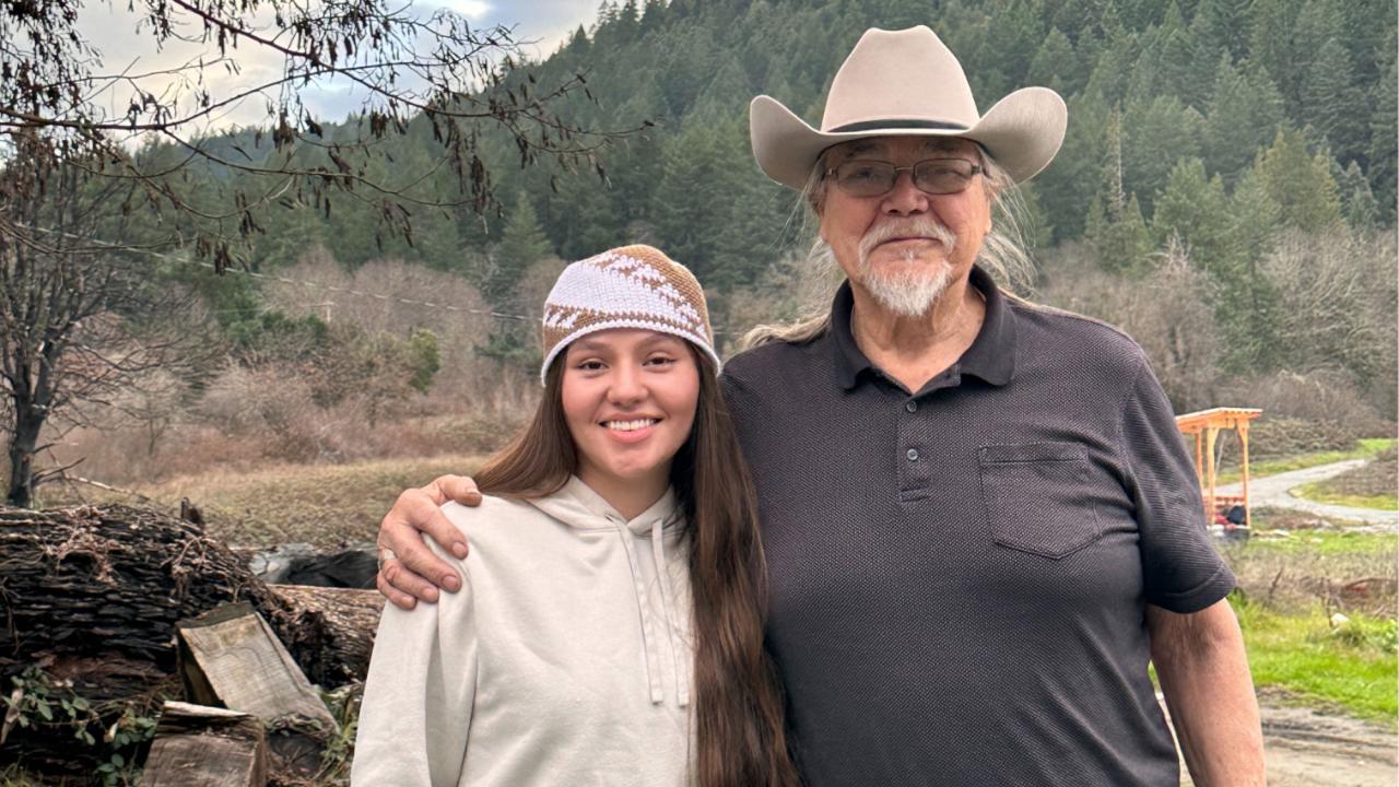 Granddaughter and grandfather share their Native American Craft at a recent craft fair at UC Davis