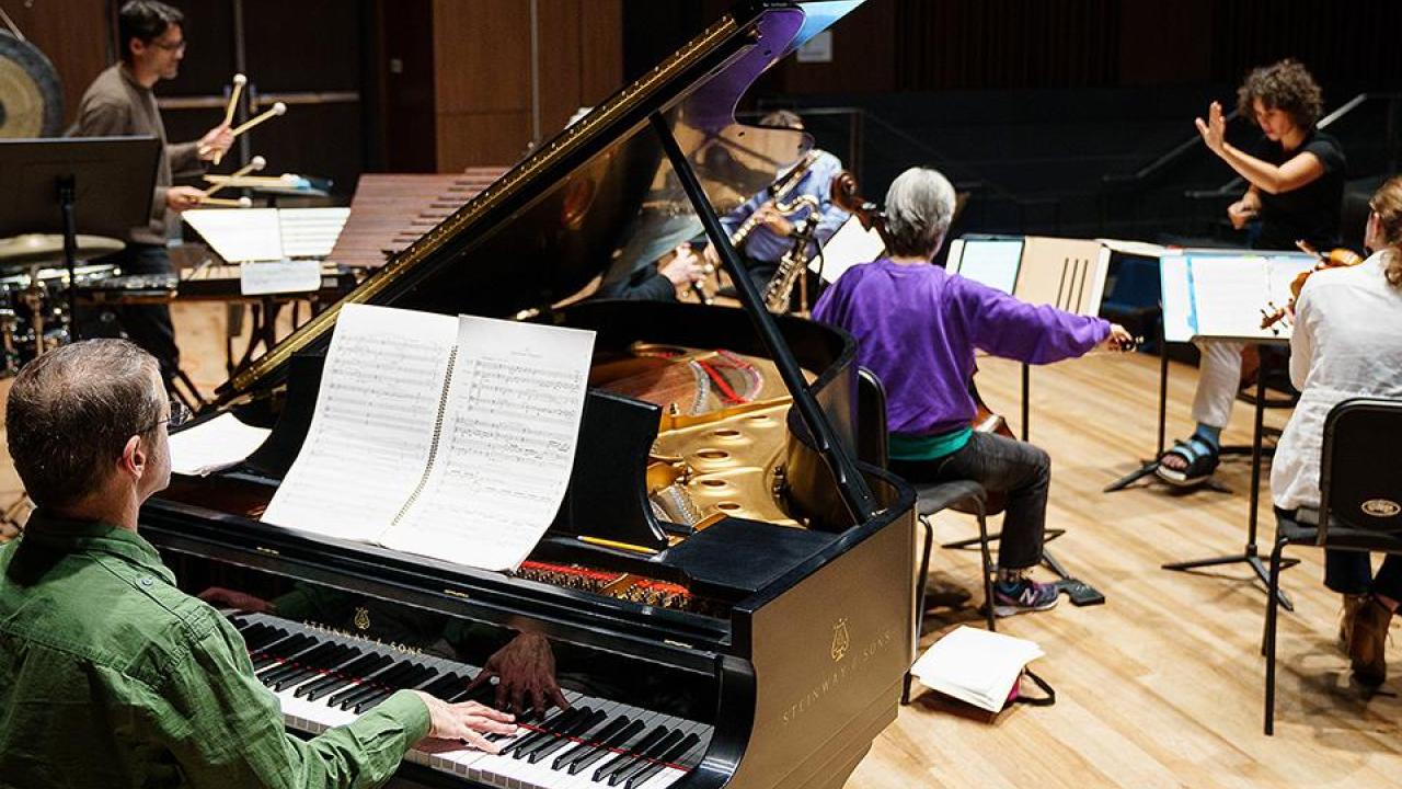 Musical ensemble on wooden stage