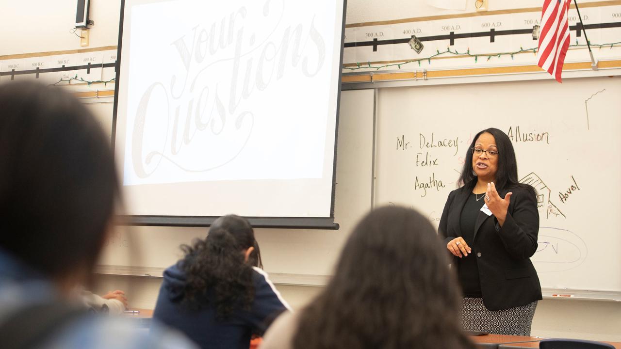 instructor gives lesson on financial aid options 