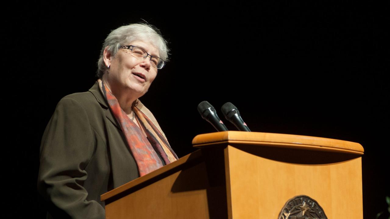 Jessie Ann Owens speaks at podium, UC Davis faculty