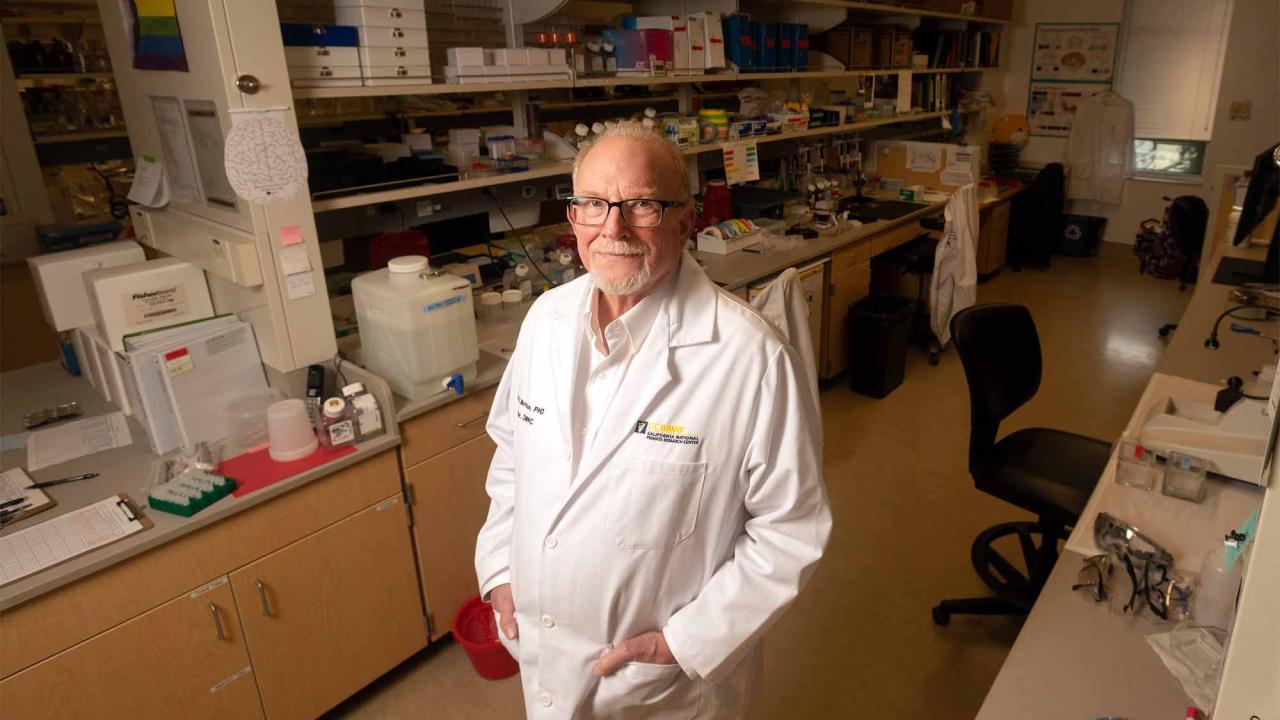 John Morrison stands in lab