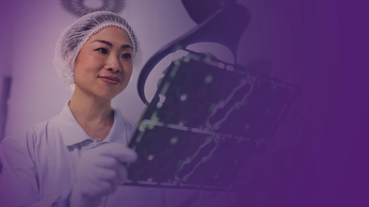 A person looking at some x-rays in a lab