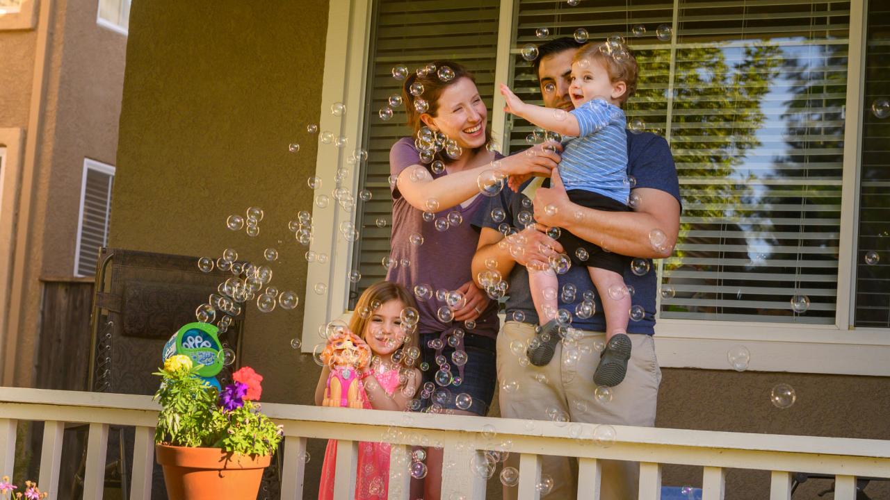 Pandemic Portrait, family blows bubbles