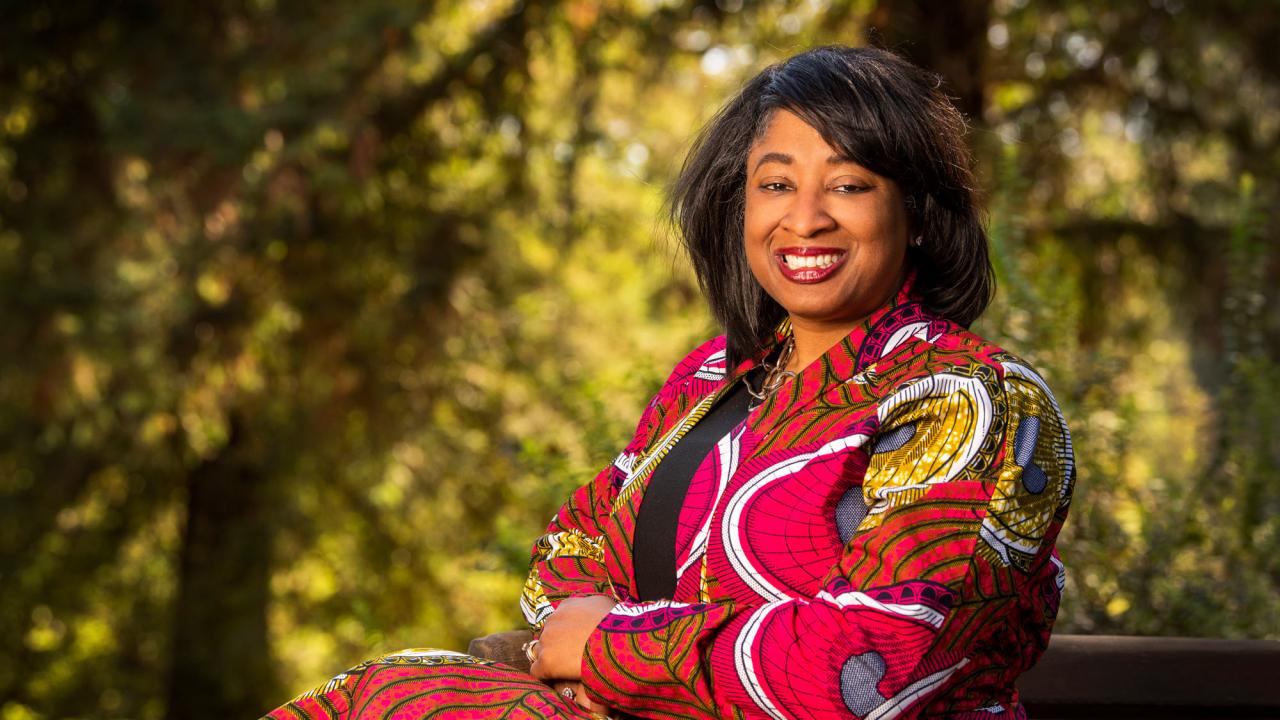 Renetta Garrison Tull in pink dress, environmental