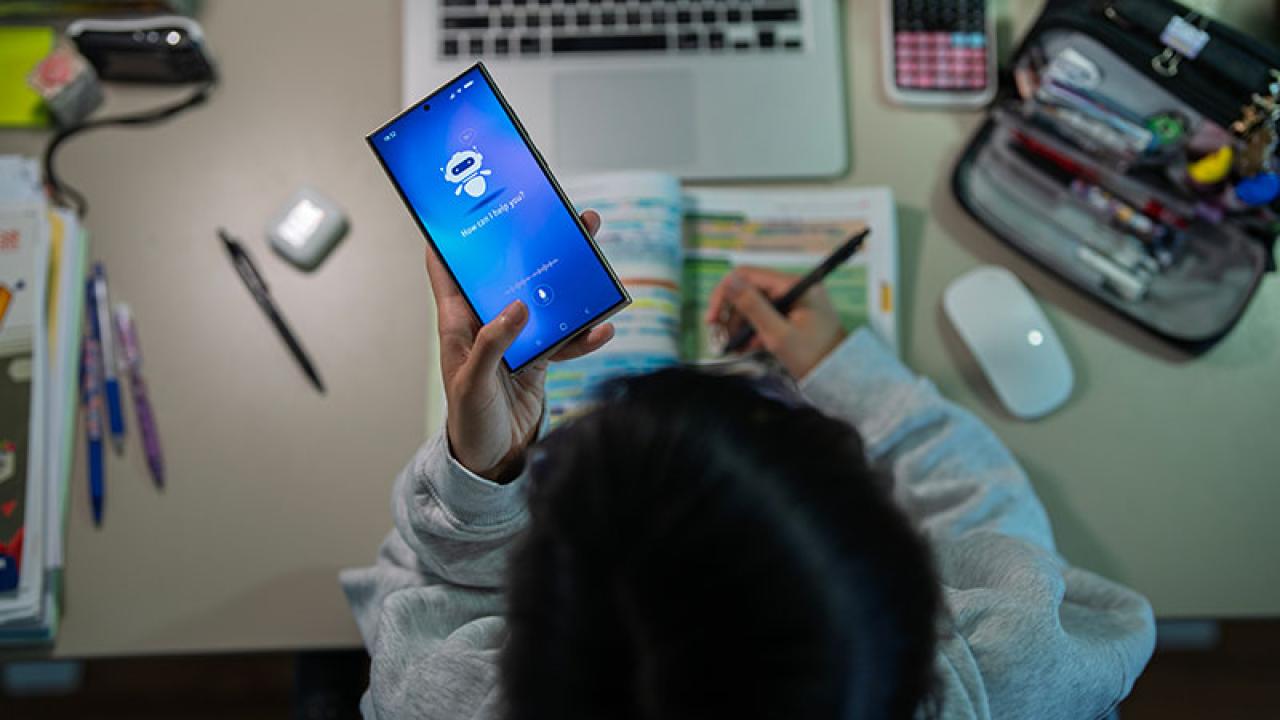 A teen uses an AI chatbot