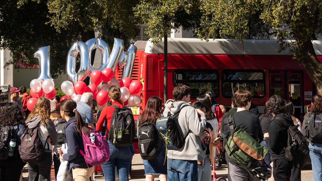 People gather for Unitrans’ 100 millionth rider celebration