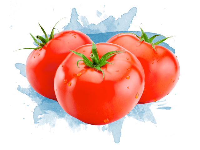 Three fresh tomatoes with a paint splotch in the background