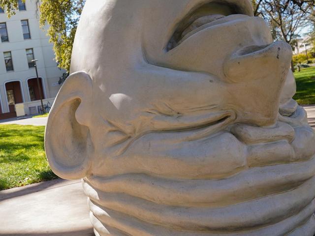 A view of the Egghead sculpture, Eye on Mrak in front of the Mrak Hall