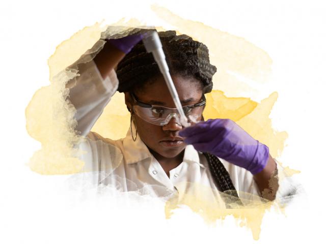 A female student filling a flask with a pipette