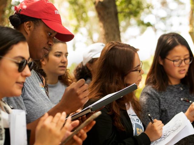 students taking notes during a class - Personal Insight Questions