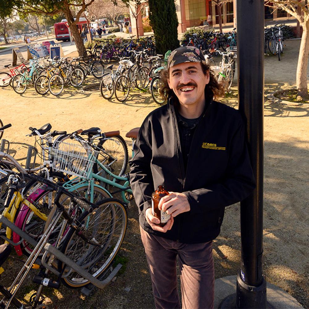 Photo of Jeff Bruchez among many bicycles.