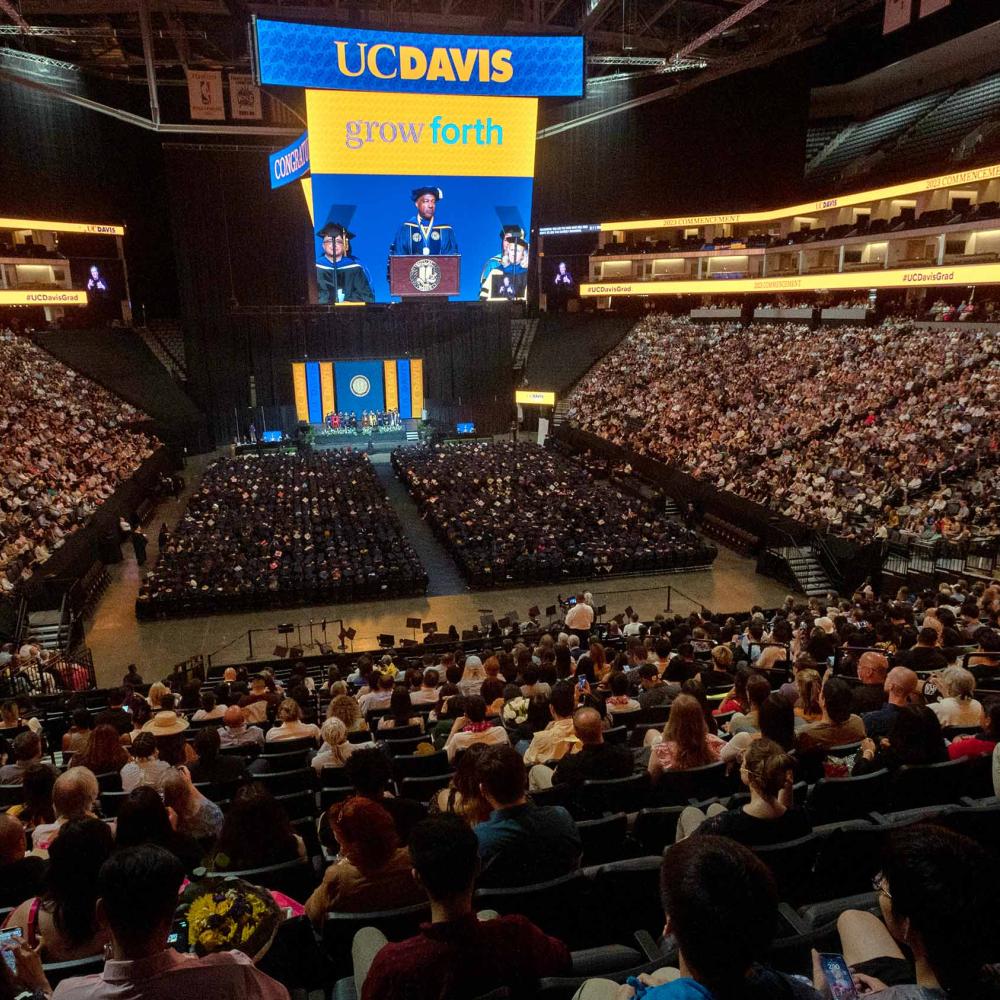 Chancellor Gary S. May addresses the crowd at commencement at Golden 1 Center