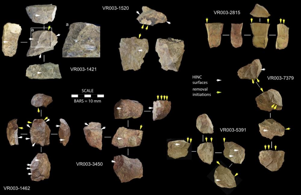 Archaeological collection of stone fragments arranged on a black background.