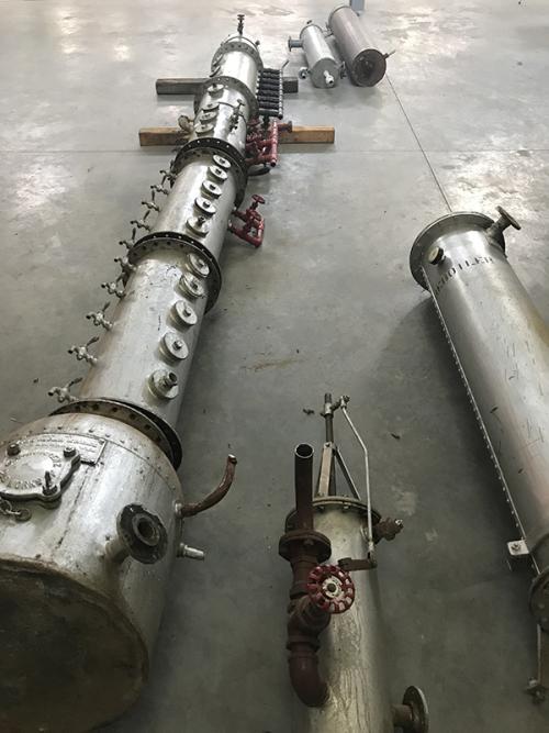 Big metal pipes lying on the floor