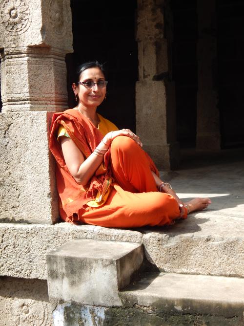 Woman sitting on step