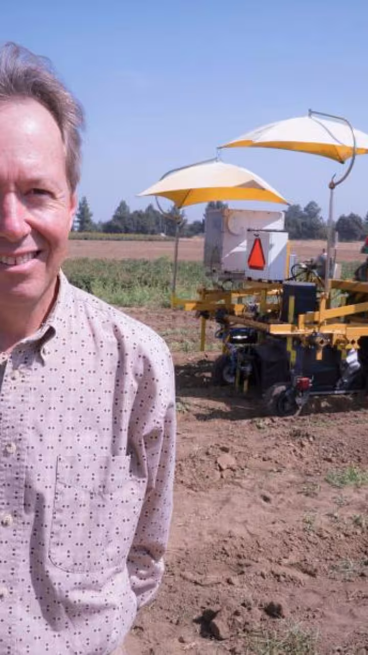 Man and tractor at UC Davis. 