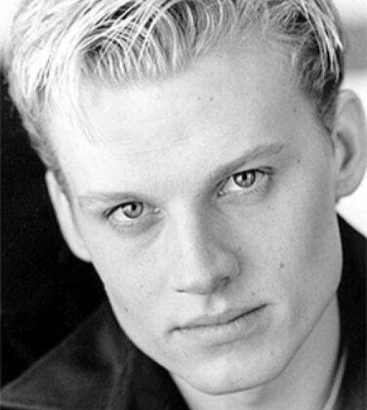 Black-and-white headshot of man