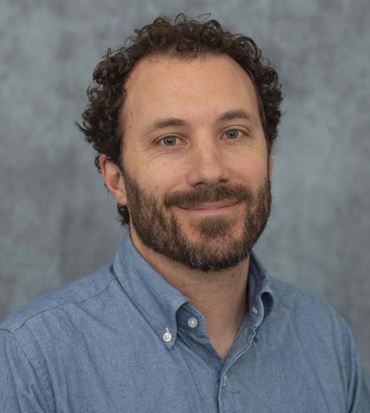 Faculty member portrait with gray background