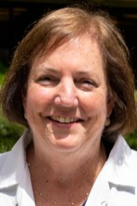 Deb Neff in lab coat, headshot, UC Davis donor